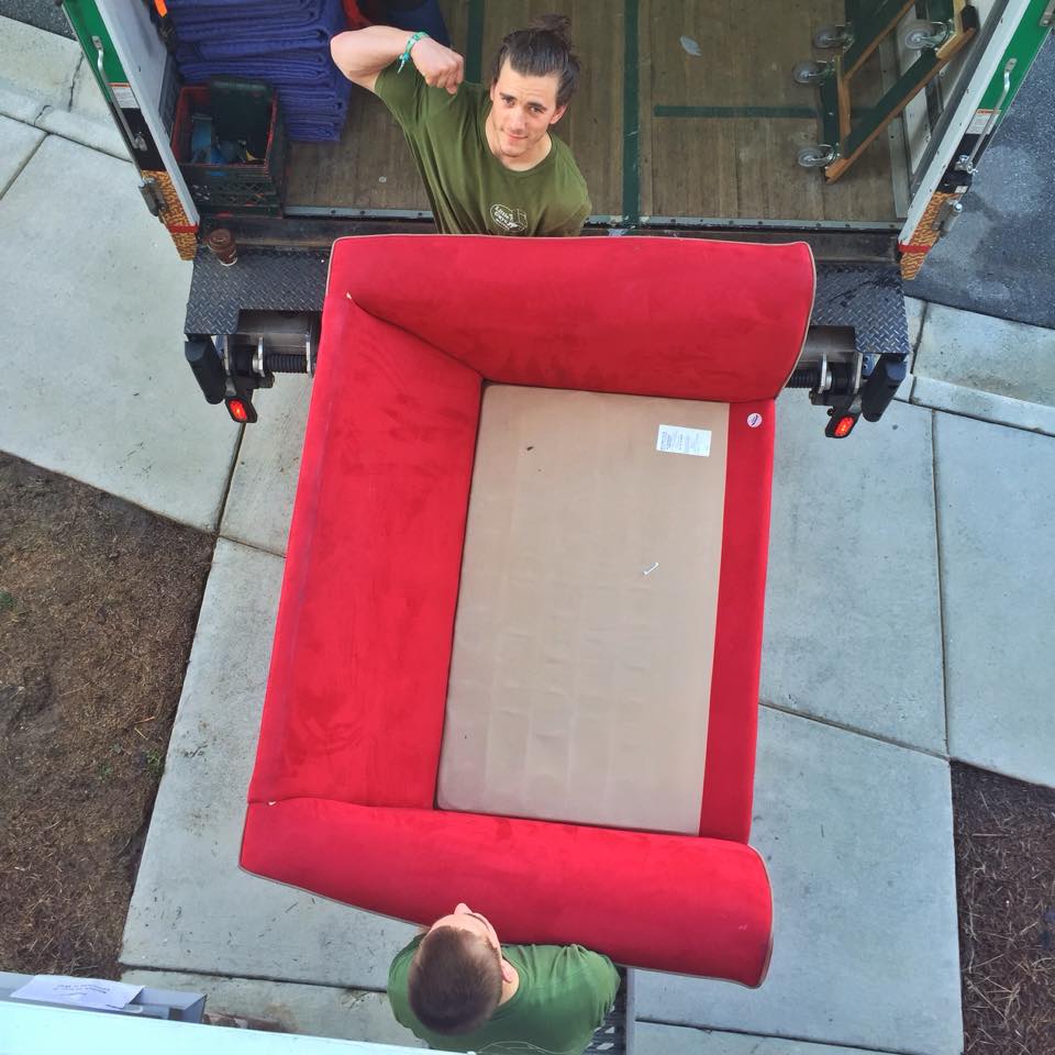 Greensboro movers carrying furniture