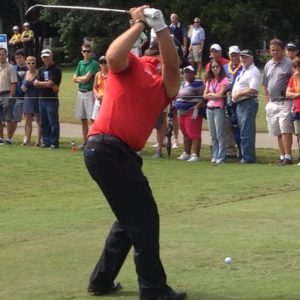 Man hitting golf ball at Wyndham Championship