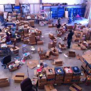 warehouse full of boxes and people organizing books