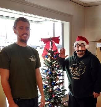 Two movers with small Christmas tree