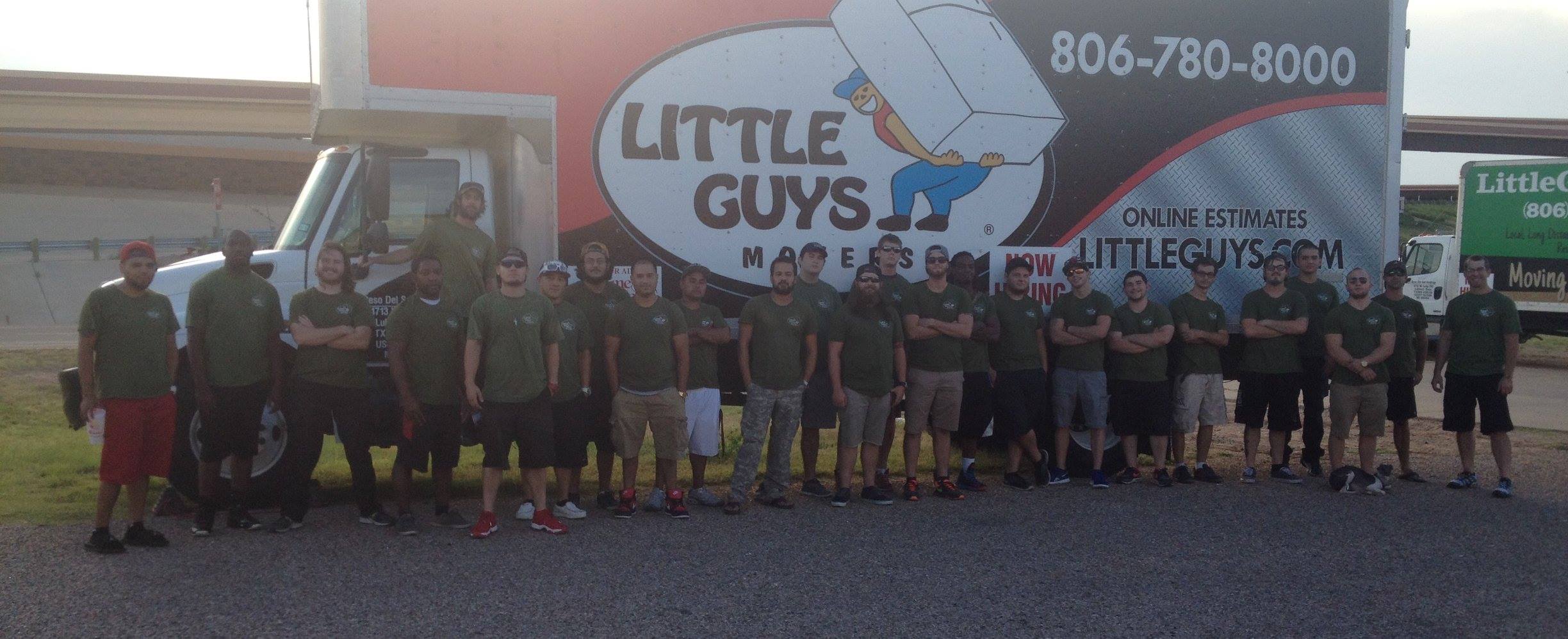 Lubbock Little Guys in front of moving truck