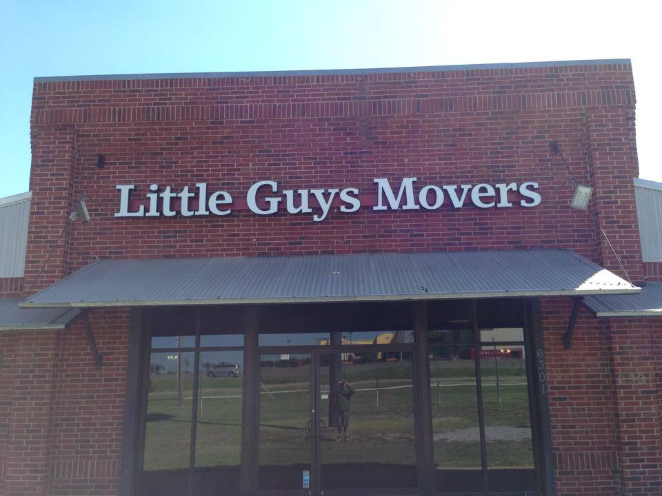 Norman Little Guys Movers headquarters sign