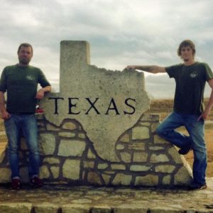 Norman Little Guys with Texas sign