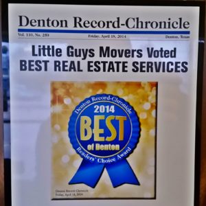 Newspaper announcing Little Guys Movers as Best Real Estate Services in Denton