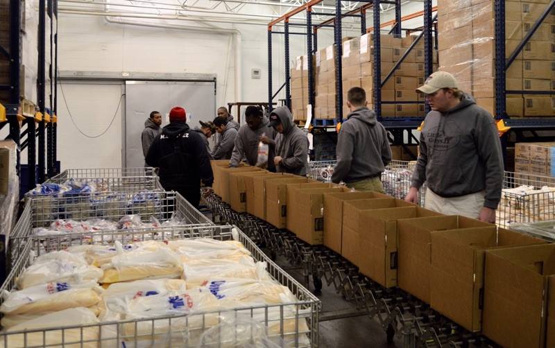 Little Guys Lubbock lend a hand to the South Plains Food Bank
