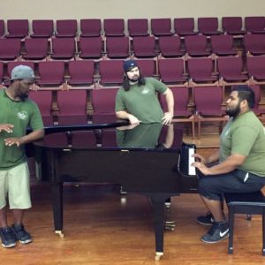 BCS Little Guys Movers with a piano