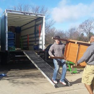 Little Guys Movers in Fayetteville moving furniture