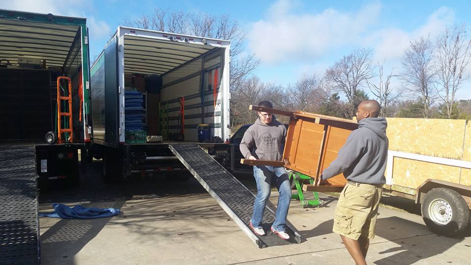 Little Guys Movers in Fayetteville moving furniture