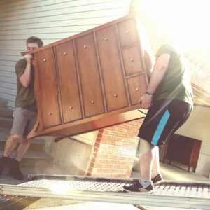 two Little Guys moving furniture