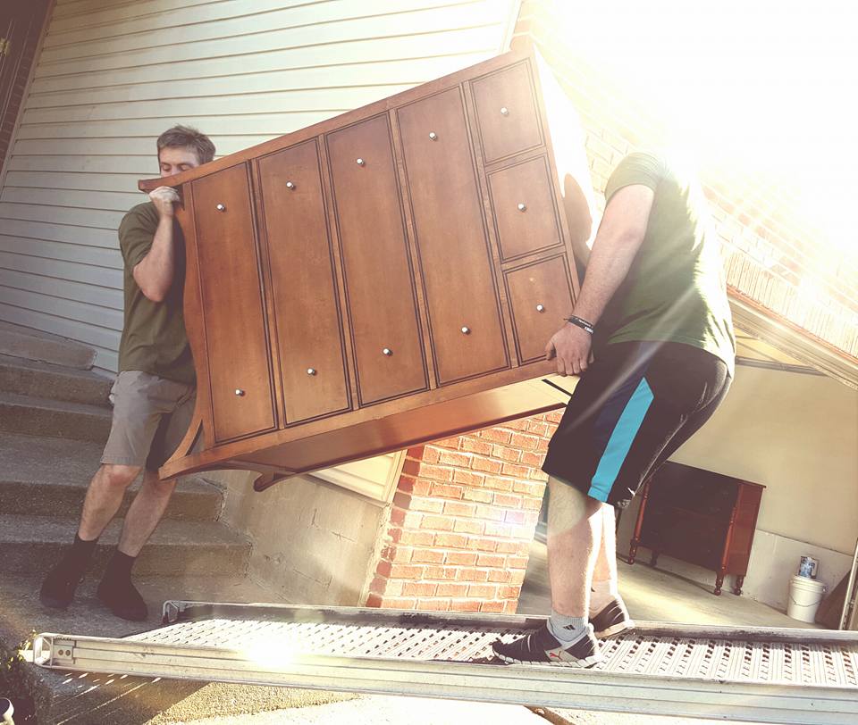 two Little Guys moving furniture
