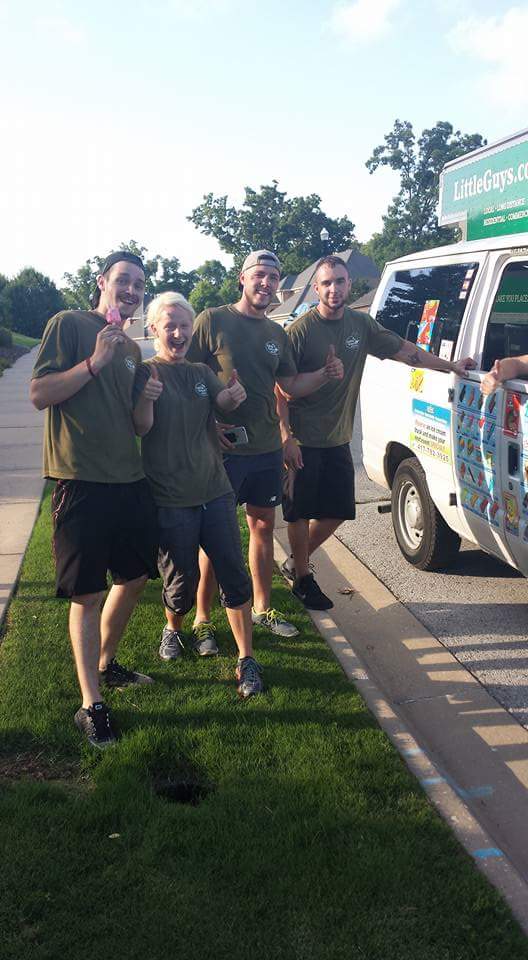 A moving crew stopping for ice cream.