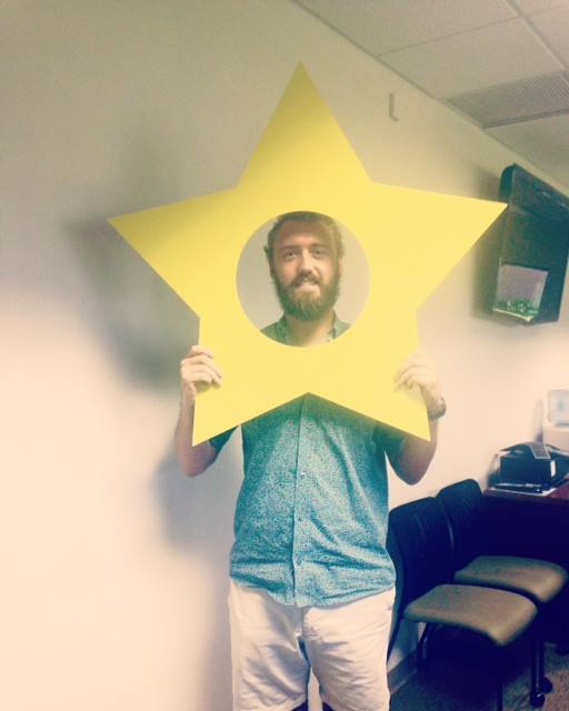 Andrew Harmon with a yellow star mask