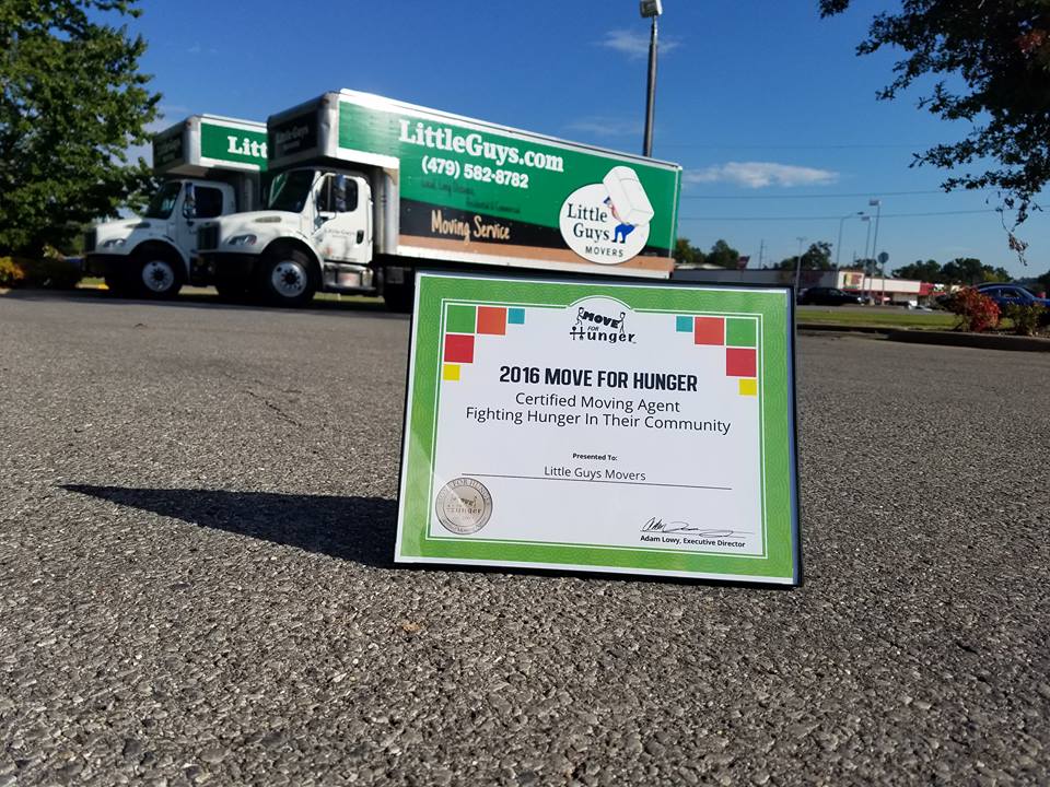 A certificate recognizing Little Guys Movers' efforts to combat hunger.