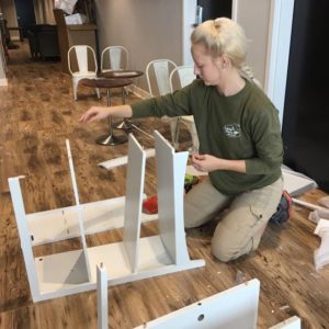 Fayetteville mover assembling a bookshelf