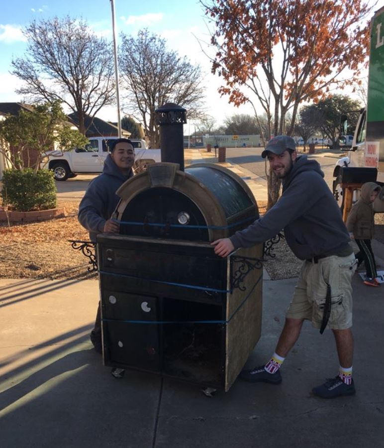Some Little Guys Movers with an 800 lb pizza oven