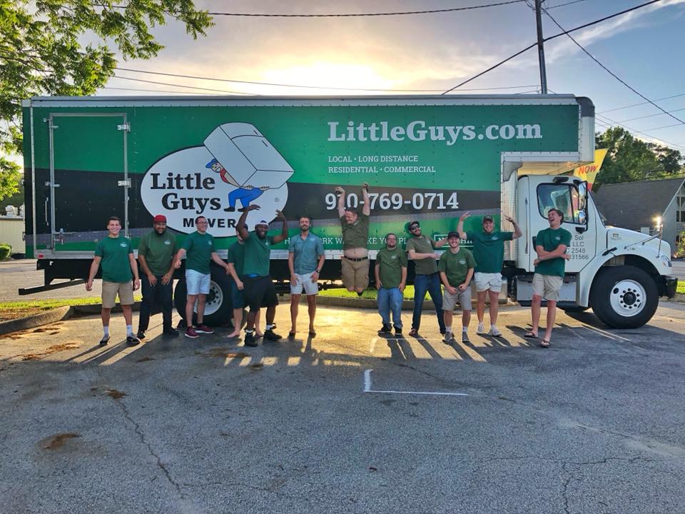 wilmington little guys movers in front of a truck