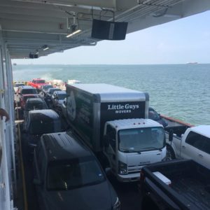 Little Guys Movers truck on a ferry