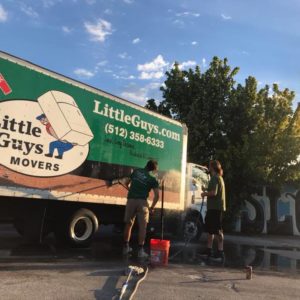 austin moving truck being washed