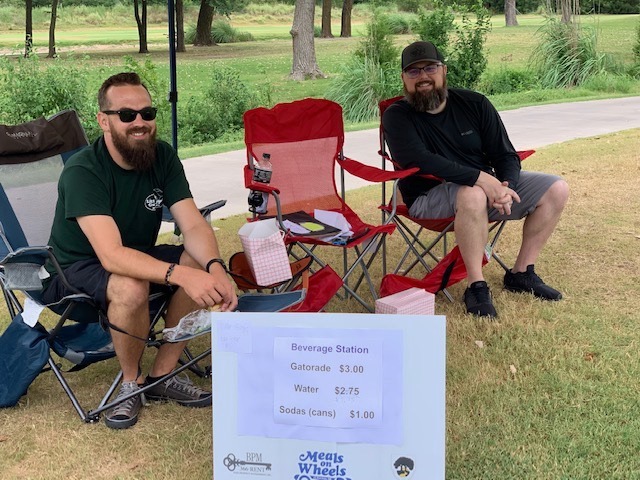 Two Little Guys employees attending the Meals on Wheels Golf Scramble