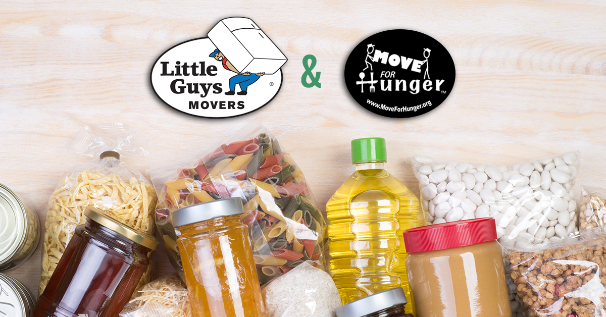 Canned goods and other food items are laid out on a wooden counter with the Move for Hunger and Little Guys Movers logos sitting above.