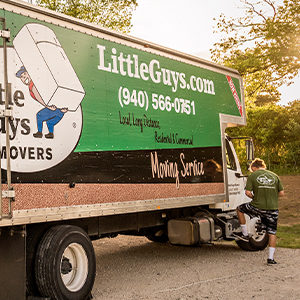 Little Guys Staff checks on moving truck