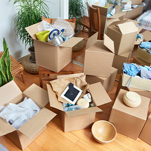 Group of moving boxes inside of an apartment