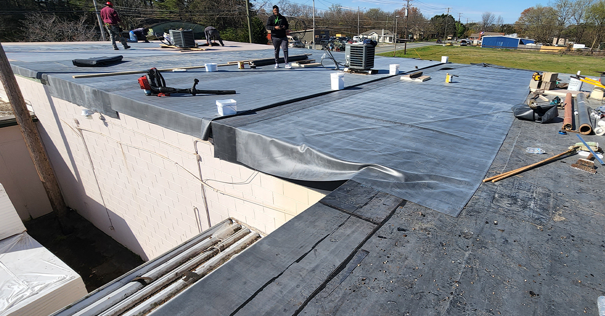 Photo of the roof repair taking place at the Gainesville location.