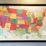 A wall map shows all of the locations Little Guys Lubbock has traveled to.