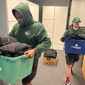 Two Little Guys Movers move items at McKinney Chamber of Commerce's 26th Annual Golf Classic.