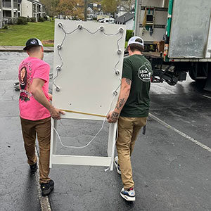 Little Guys Movers from Gainesville help out their fellow Little Guys in Greensboro.