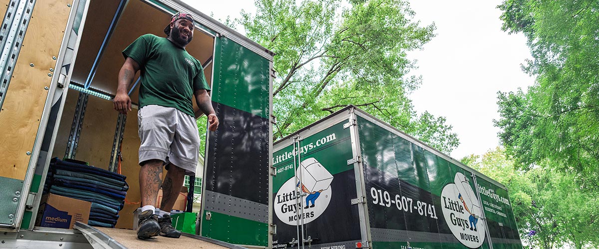 2 side-by-side pictures of sparkling clean moving trucks